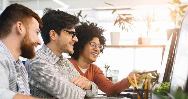 IT Professionals working in front of computer