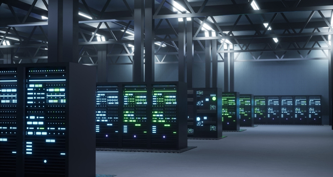 Wide view of a modern data center with illuminated server racks